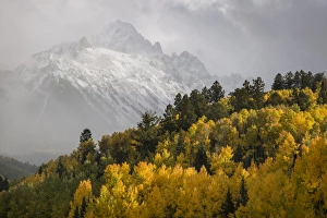 USA, Colorado, Sneffels Range. Snow clouds over Mt Sneffels at sunset. Credit as