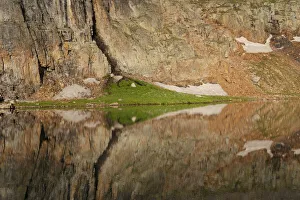 USA, Colorado, Uncompahgre National Forest. Cliff face reflected in Bullion King Lake