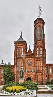 USA, District of Columbia. Smithsonian Castle on a snowy afternoon