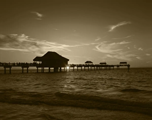 Sepia Tone Prints: USA, Florida, Clearwater beach and pier at sunset