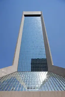 Office Building Prints: USA, Florida, Jacksonville, Clear blue sky reflected off glass office tower in downtown