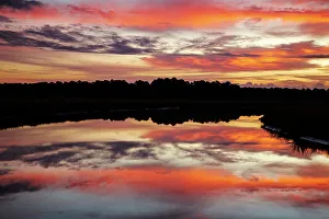 Images Dated 22nd March 2022: USA, Georgia, Savannah. Sunrise along Grimball Creek