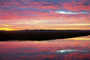 Images Dated 22nd March 2022: USA, Georgia, Savannah. Sunrise along Grimball Creek