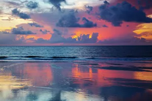 Joanne Wells Prints: USA, Georgia, Tybee Island. Sunrise with reflections and clouds