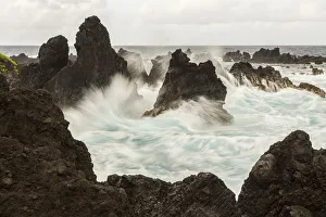 Lava Prints: USA, Hawaii, Laupahoehoe Beach Point State Park. Crashing waves on shore rocks. Credit as
