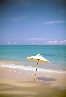 Watercraft Prints: USA, Hawaii. Umbrella on beach