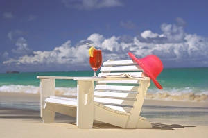 Images Dated 16th March 2007: USA, Hawaiian Islands. Beach chair, cocktail and sun hat