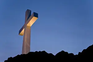 Hilltop Prints: USA, Idaho, Caldwell. Lizard Butte cross is lit for a special event