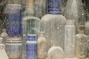 Images Dated 26th July 2007: USA, Idaho, Idaho City. Close-up of dusty bottles in window