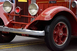 Parade Prints: USA, Indiana, Carmel. The front end of a vintage red truck