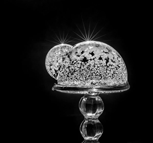 Frozen Prints: USA, Indiana, Carmel. Frozen soap bubbles with starbursts on wine glass base