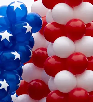Strip Prints: USA, Indiana, Carmel. Patriotic balloons displayed on 4th of July