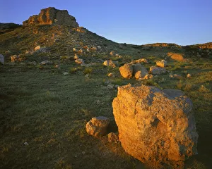 National Grassland Prints: USA, Kansas, Cimarron National Grassland, Boulders at sunset at the Point of Rocks