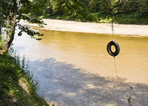 Tire Prints: USA, Louisiana. Lower Mississippi River Basin, St. Francisville, road to Cat Island