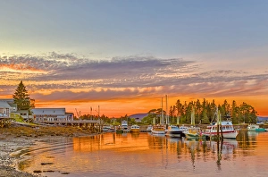 Images Dated 11th August 2013: USA, Maine, Acadia, Bass Harbor. Boats rest in harbor at sunset
