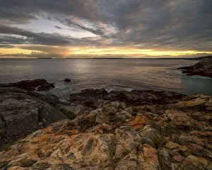 USA, Maine, Acadia National Park. Moody sunset on ocean coastline
