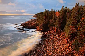 USA; Maine; Acadia National Park; Ocean waves breaking on rocks along Ocean Drive