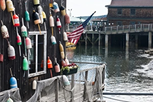 Buoy Prints: USA, Maine, Bar Harbor. Waterfront shop on pier. Credit as: Nancy Rotenberg / Jaynes