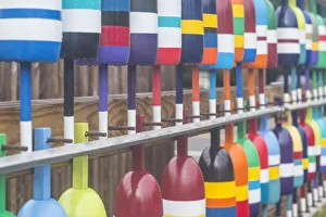 USA, Maine Cape Neddick. New lobster buoys for sale