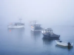 Fishing Boat Prints: USA, Maine. Fishing boats in the harbor with fog