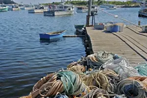 Schoodic Prints: USA, Maine, Gouldsboro. Rope piled on a pier in a fishing village