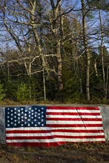 USA, Maine, Five Islands, US flag painted on rocks