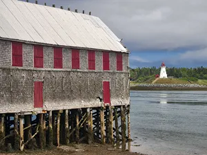 Images Dated 7th April 2020: USA, Maine, Lubec. Mulholland Point Lighthouse as seen from the town of Lubec, Maine
