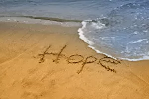 Images Dated 2nd June 2006: USA, Maine, Phippsburg. The word hope carved in Popham Beach sand near surf. Credit as