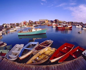 Rockport Prints: USA, Maine, Rockport. View of town buildings and colorful boats in bay. Credit as