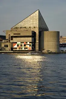 Maryland Prints: USA, Maryland, MD, Baltimore. The National Aquarium reflects in the Inner Harbor