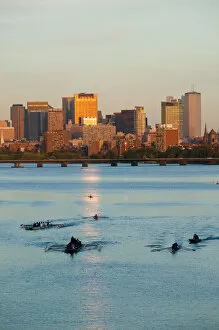 USA-Massachusetts-Boston: Sunset View of Financial District and Rowers on the Charles