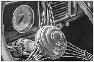 USA, Massachusetts, Essex. Interior detail of antique cars, 1940's-era steering wheel