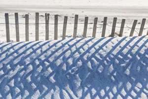 USA, Massachusetts, Nantucket Island. Madaket. Madaket Beach, sand fence and shadows