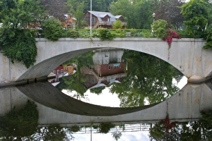 Images Dated 8th July 2006: USA, Massachusetts, Shelburne Falls. The Bridge of Flowers and colorful buildings
