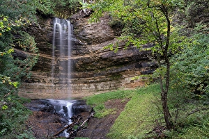USA, Michigan, Hiawatha National Forest. Landscape with Munising Falls and sandstone cliff. &copy;Don Grall / Jaynes Gallery / DanitaDelimont.com