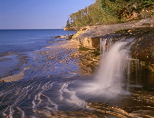 Eroded Prints: USA, Michigan, Pictured Rocks National Lakeshore, Small waterfall courses across
