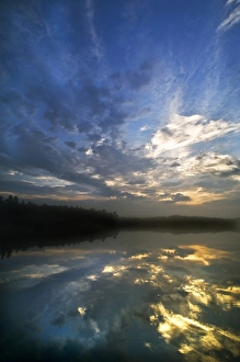 Sun Rise Prints: USA, Michigan, Upper Peninsula. Sunrise sky reflected in Petes Lake