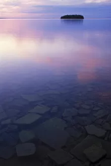 USA, Michigan, Upper Peninsula, Picnic Island, Lake Huron, clouds at twilight. Mark S