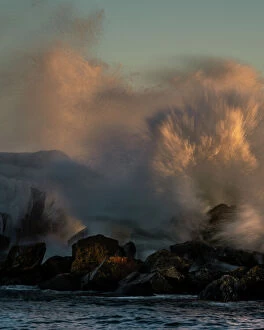 Editor's Picks: USA, Minnesota, Lake Superior. Lake waves breaking on rocks at sunset