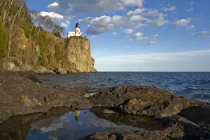 Images Dated 22nd October 2007: USA, Minnesota. Split Rock Lighthouse reflects in a pool on the shore of Lake Superior