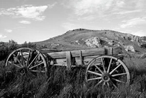 Black and White Gallery: USA, Montana, Bannack State Park Old wagon made of wood in grass near mining ghost town of Bannack