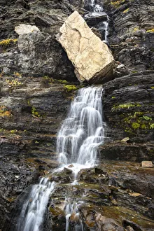 Landscape-Scenic Prints: USA, Montana. Boulder and waterfall in Glacier National Park