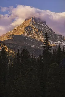 Images Dated 16th January 2022: USA, Montana, Glacier National Park. Reynolds Mountain at sunrise