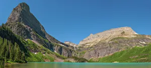 Images Dated 21st March 2023: USA, Montana, Glacier National Park. Panoramic of mountains and Grinnell Lake in summer