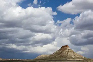 Day Light Prints: USA, Montana, Terry, Gathering storm clouds over hoodoo in badlands of eastern Montana