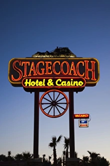 Images Dated 19th April 2011: USA, Nevada, Great Basin, Beatty, sign for Stagecoach Hotel and Casino, dawn