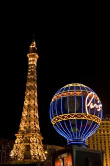 USA, Nevada, Las Vegas. Paris Las Vegas Hotel & Casino lit at night