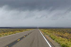 Images Dated 18th October 2015: USA, Nevada. Road into approaching storm