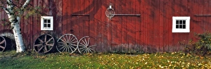 Wagon Wheel Prints: USA, New Hampshire, Franconia Notch. Autumn color enhances the deep red siding of