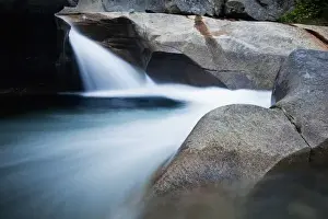 White Mountains Prints: USA, New Hampshire, Lincoln, Blurred water flowing over granite stones on Pemigewasset